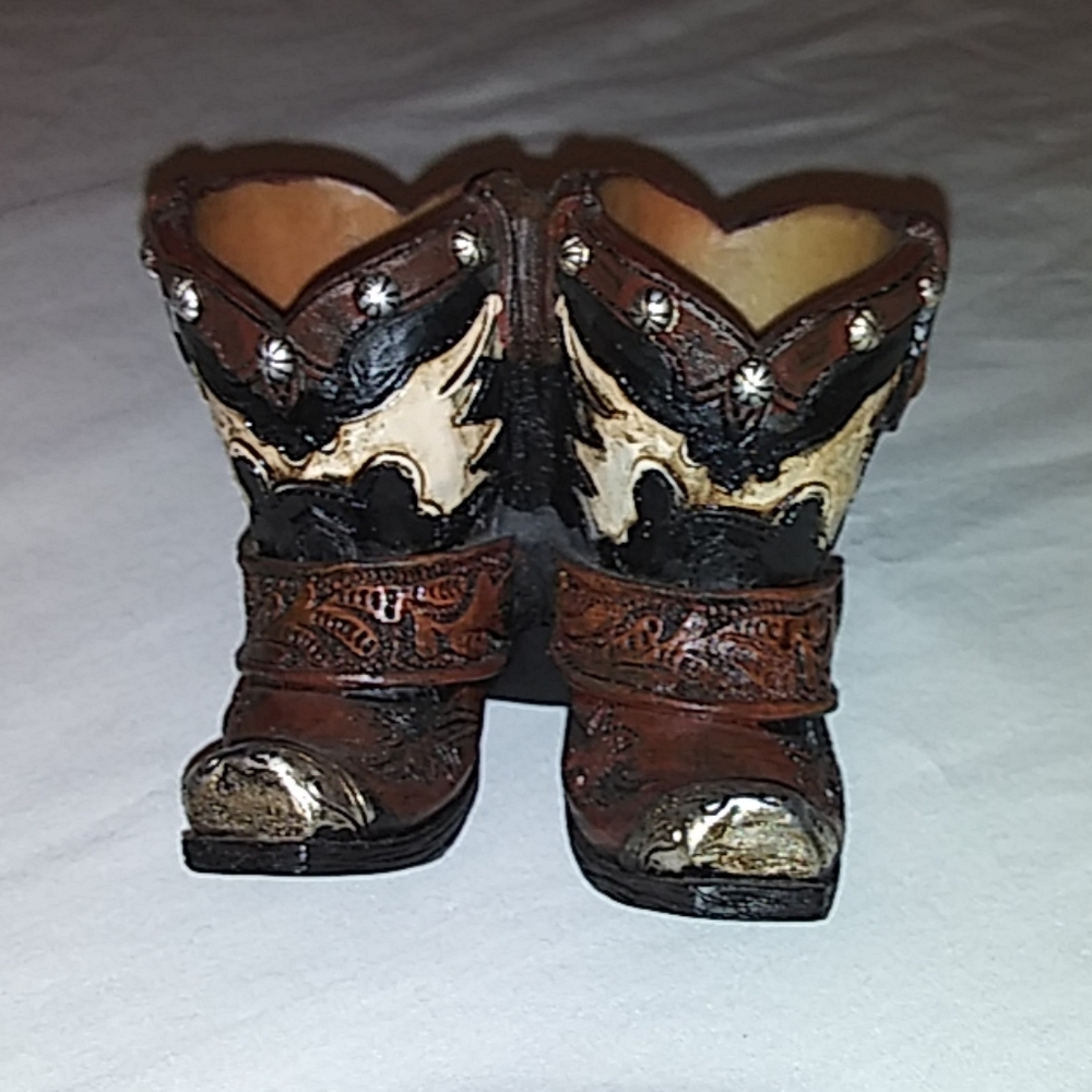 Unique miniature cowboy boots twin candle holder.